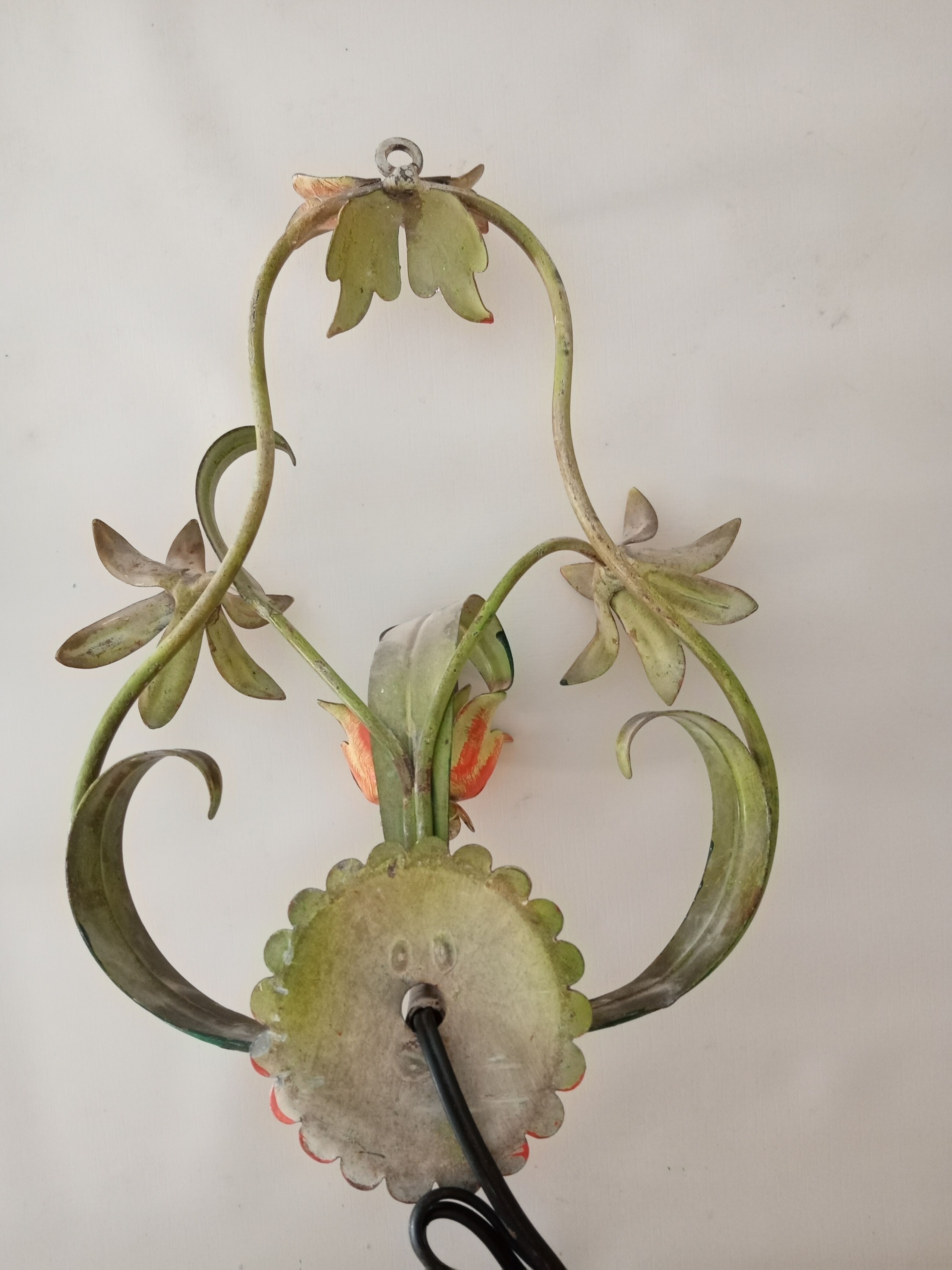 Pair to sconces metal floral decoration