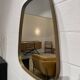 Rear view mirror and free form brass outline 75x65cm