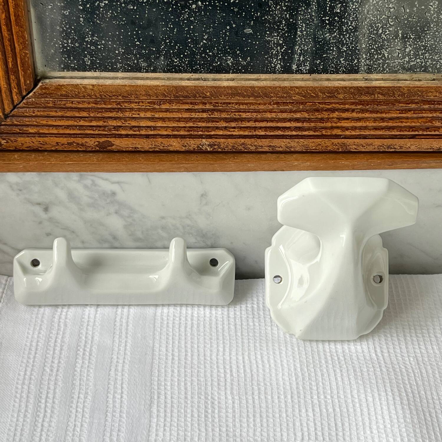 White porcelain coat hooks