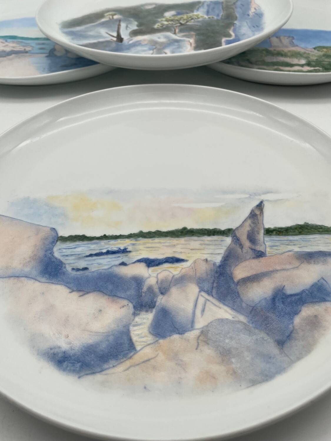 Hand painted porcelain plate with landscape decoration