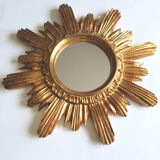 Sun mirror in gilded wood