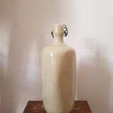 Triangular stoneware bottle