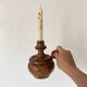 Wooden thumb candle holder