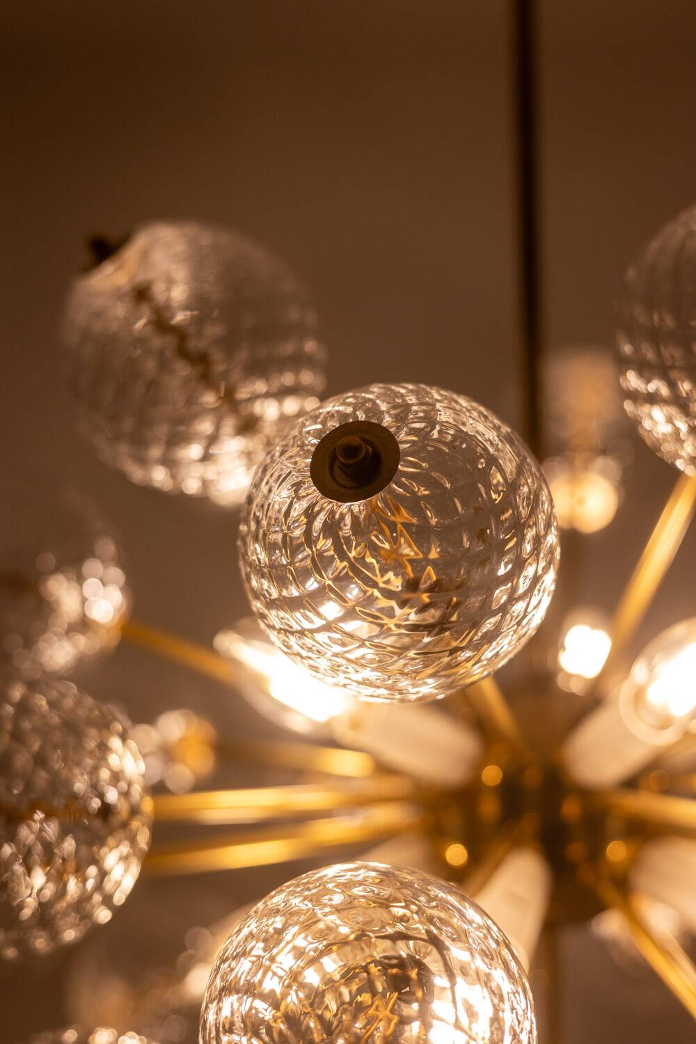 Kamenický Šenov, published by. Brass and glass chandelier. Around 1970.