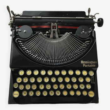 Machine à écrire remington portable en état de marche
