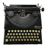 Machine à écrire remington portable en état de marche