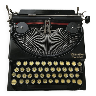 Machine à écrire remington portable en état de marche