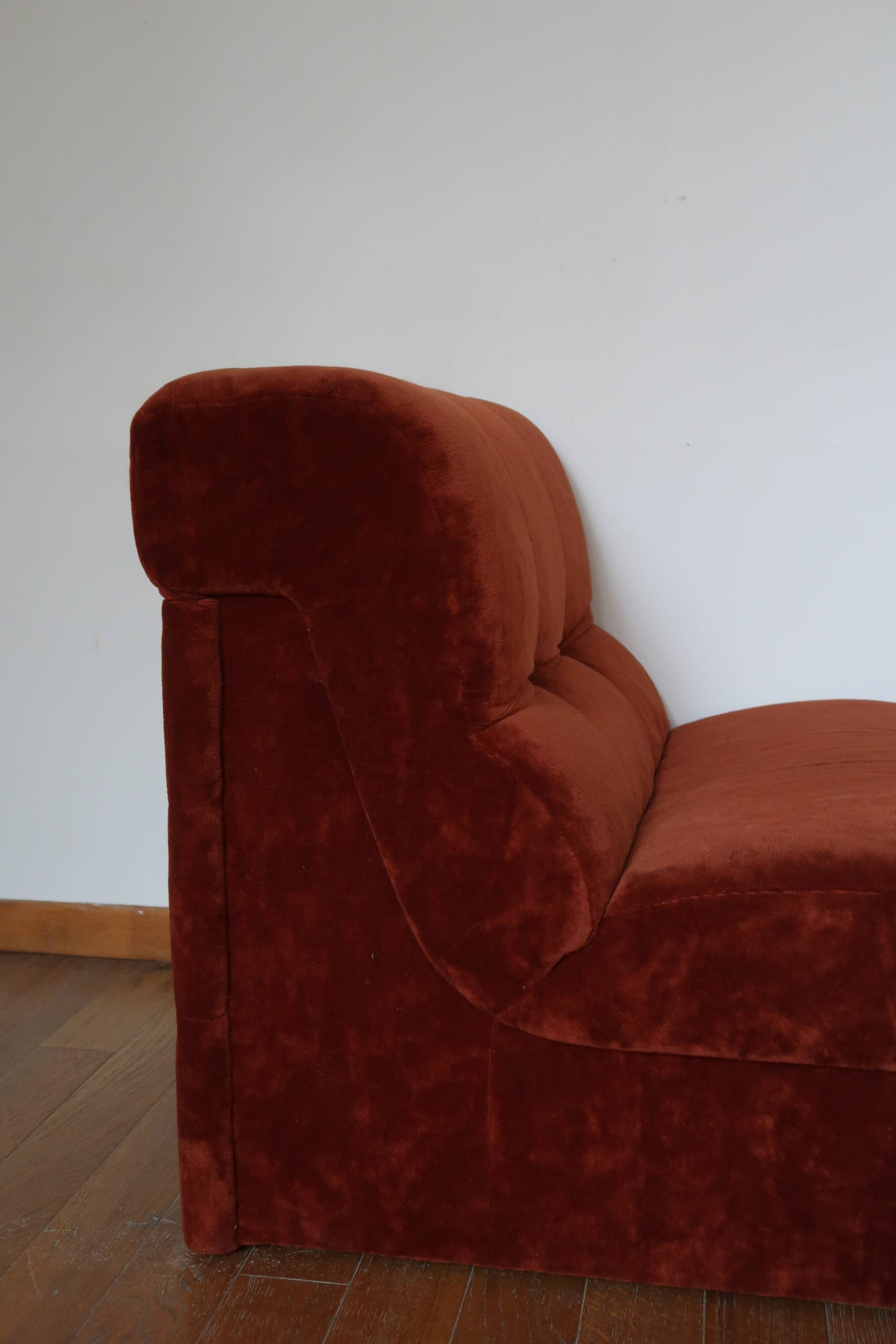 Rusty velvet low chair without arms