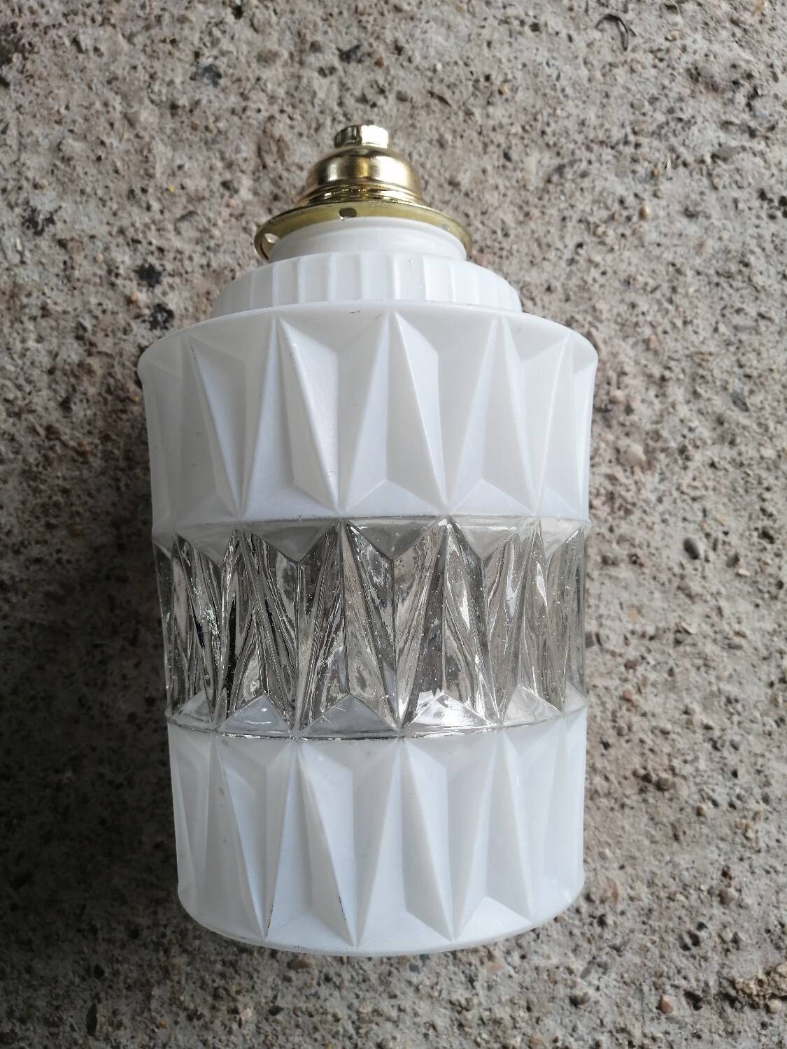 Vintage globe pendant light in molded glass.