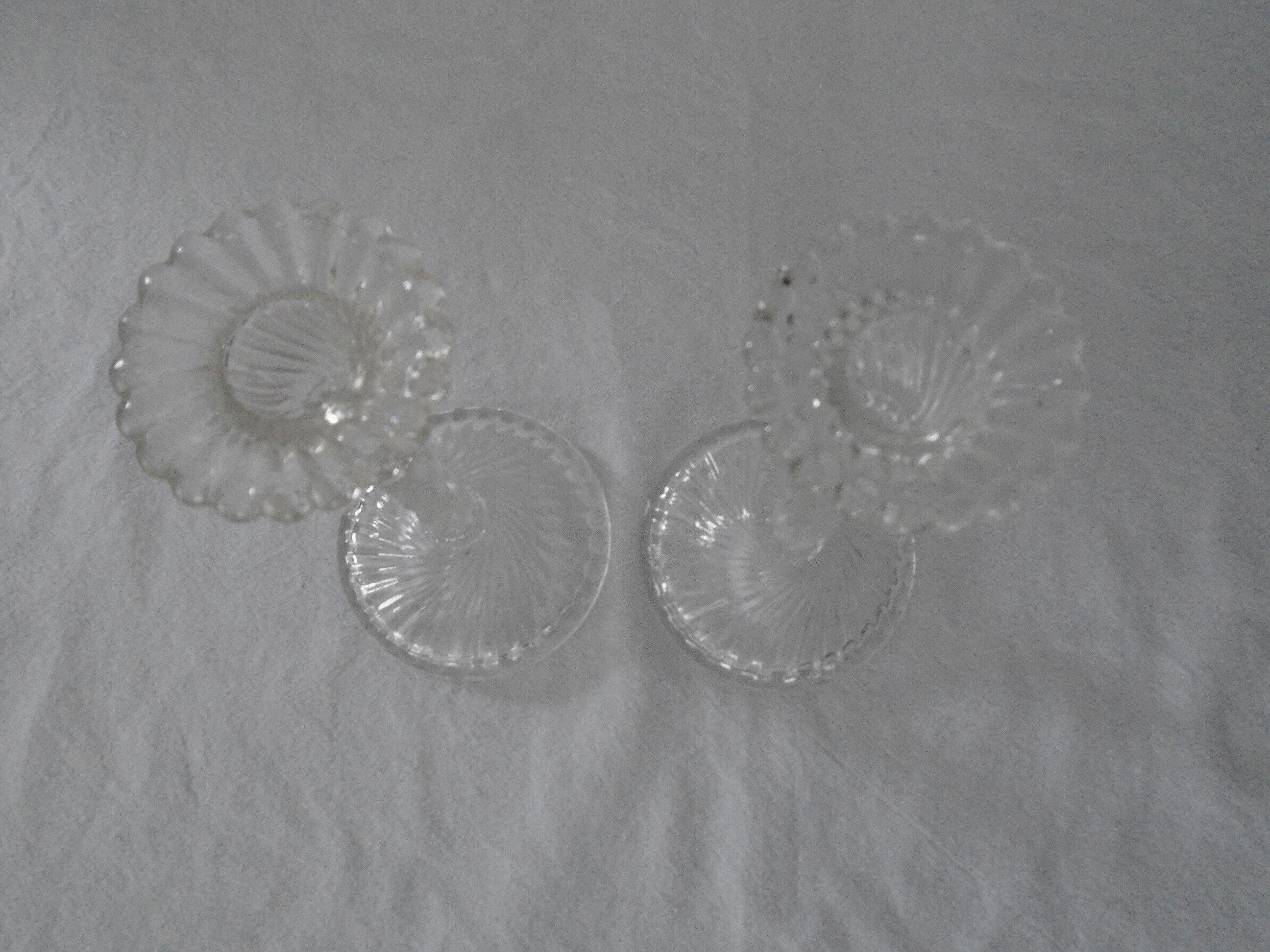 Pair of old glass candlesticks