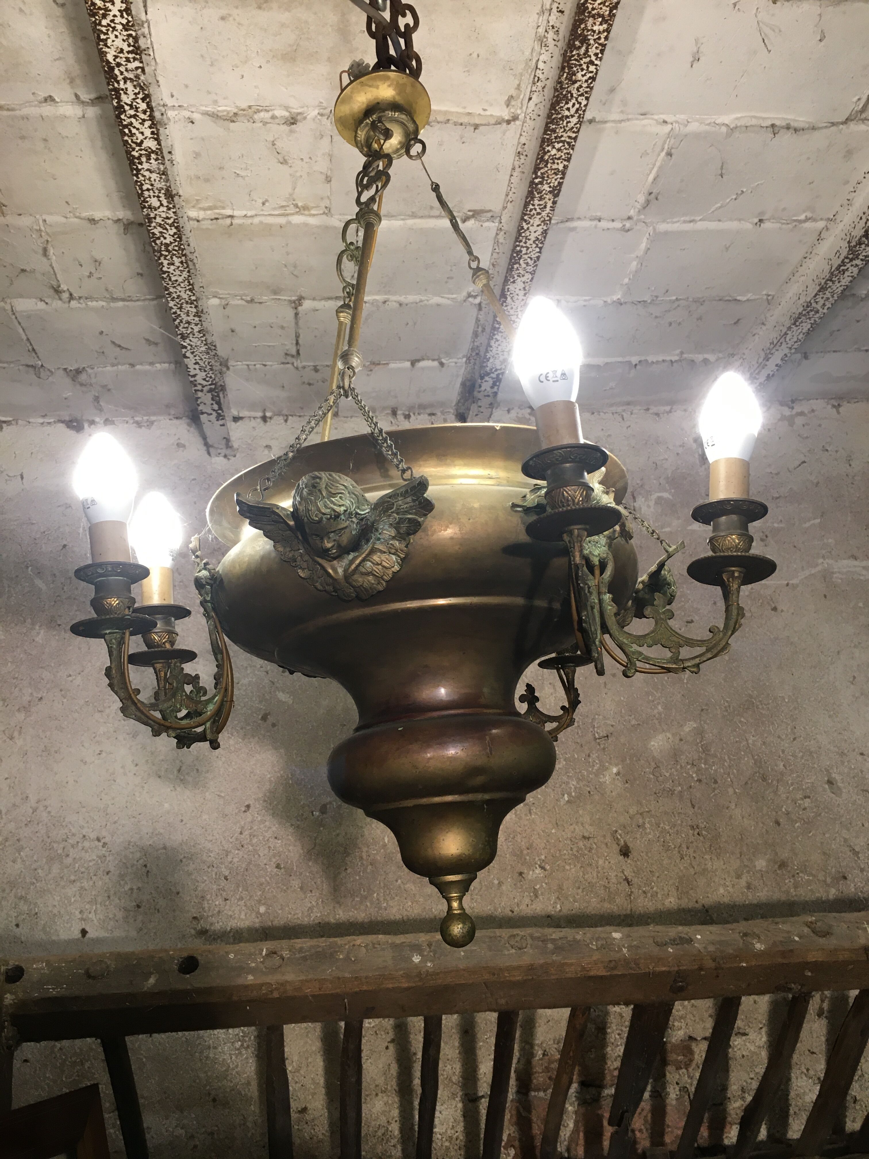 Brass chandelier with angels
