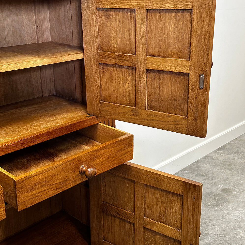 Artisan brutalist oak cabinet with turned knobs, France, 1970s
