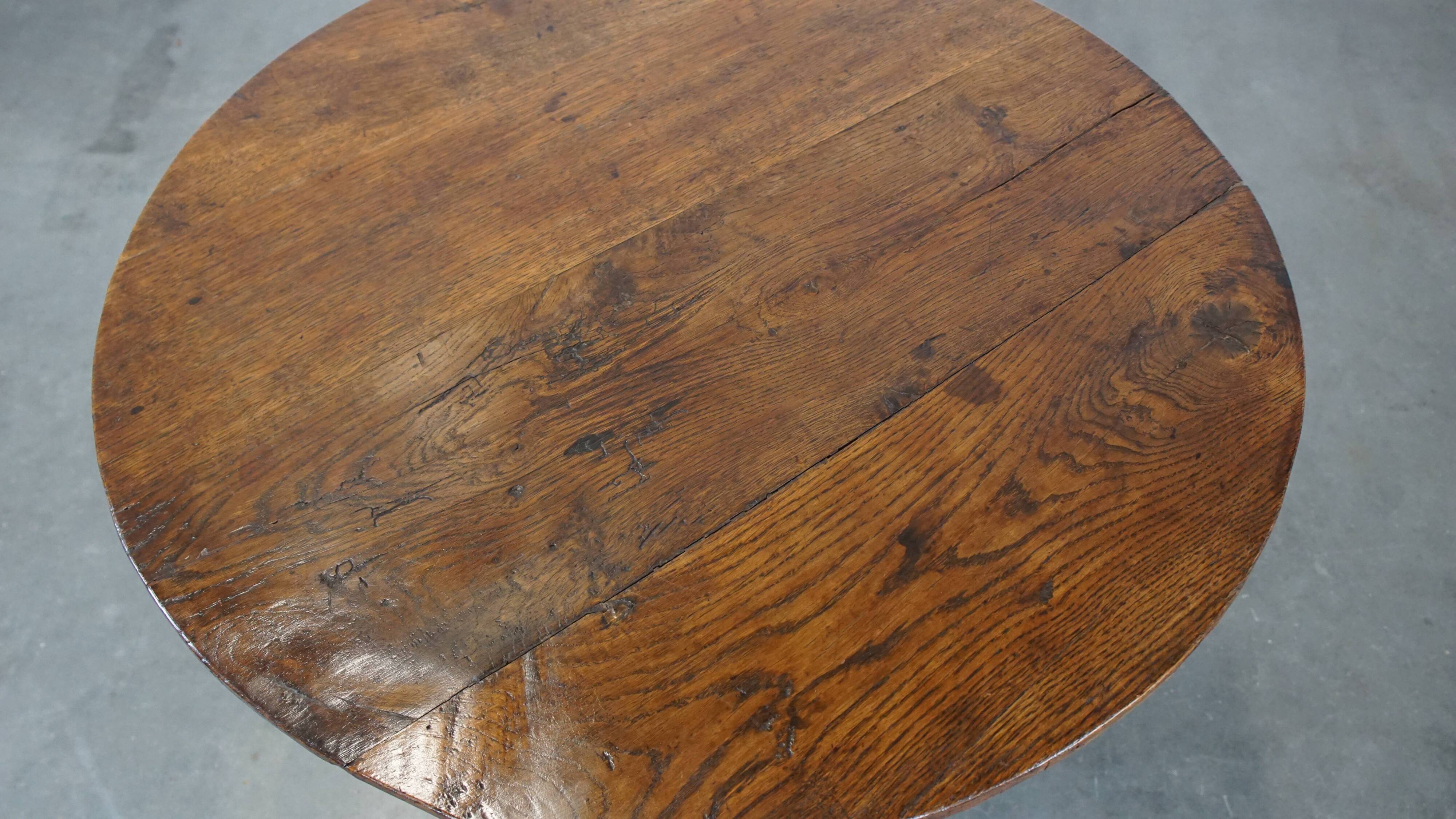 Round, folding antique 18th-century French wine/country table