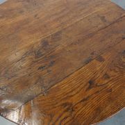 Round, folding antique 18th-century French wine/country table