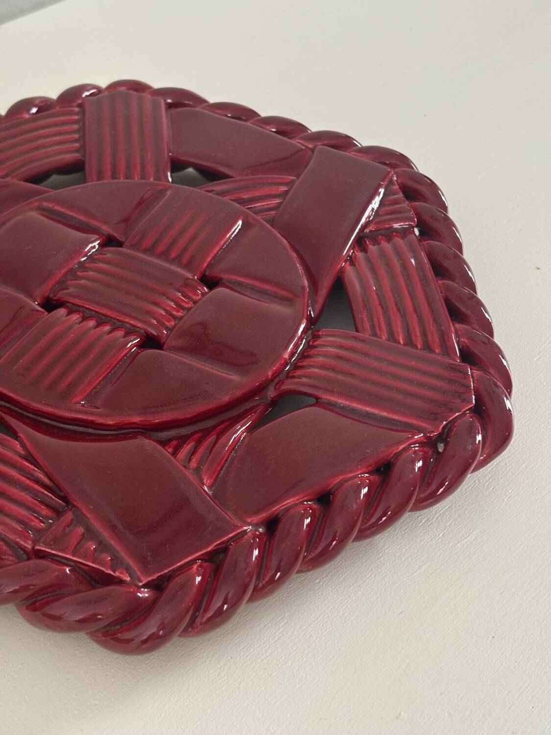 Woven ceramic trivet
