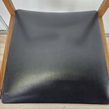 Six Scandinavian-style teak and leather dining chairs