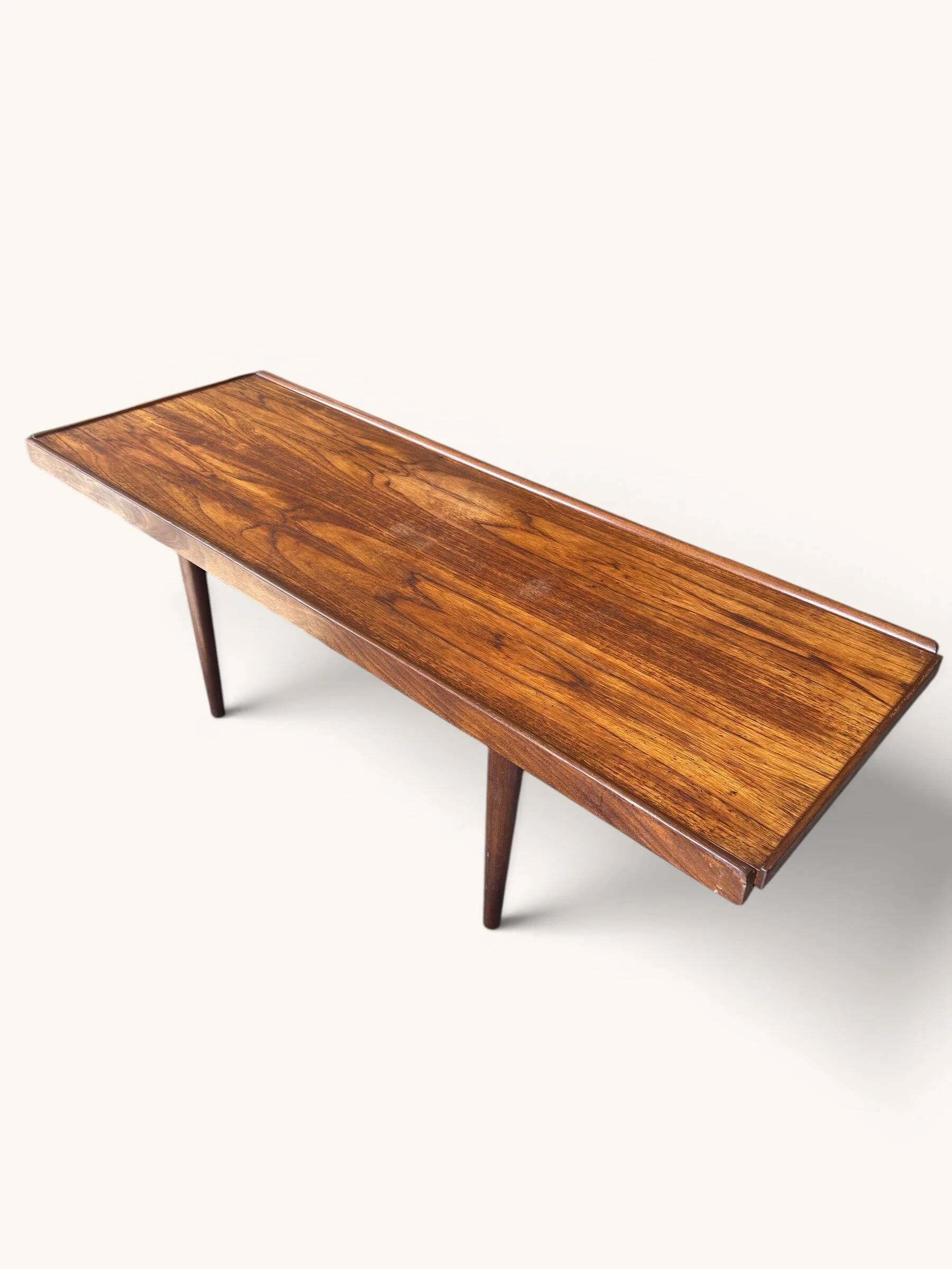 Vintage teak coffee table with a reversible top.