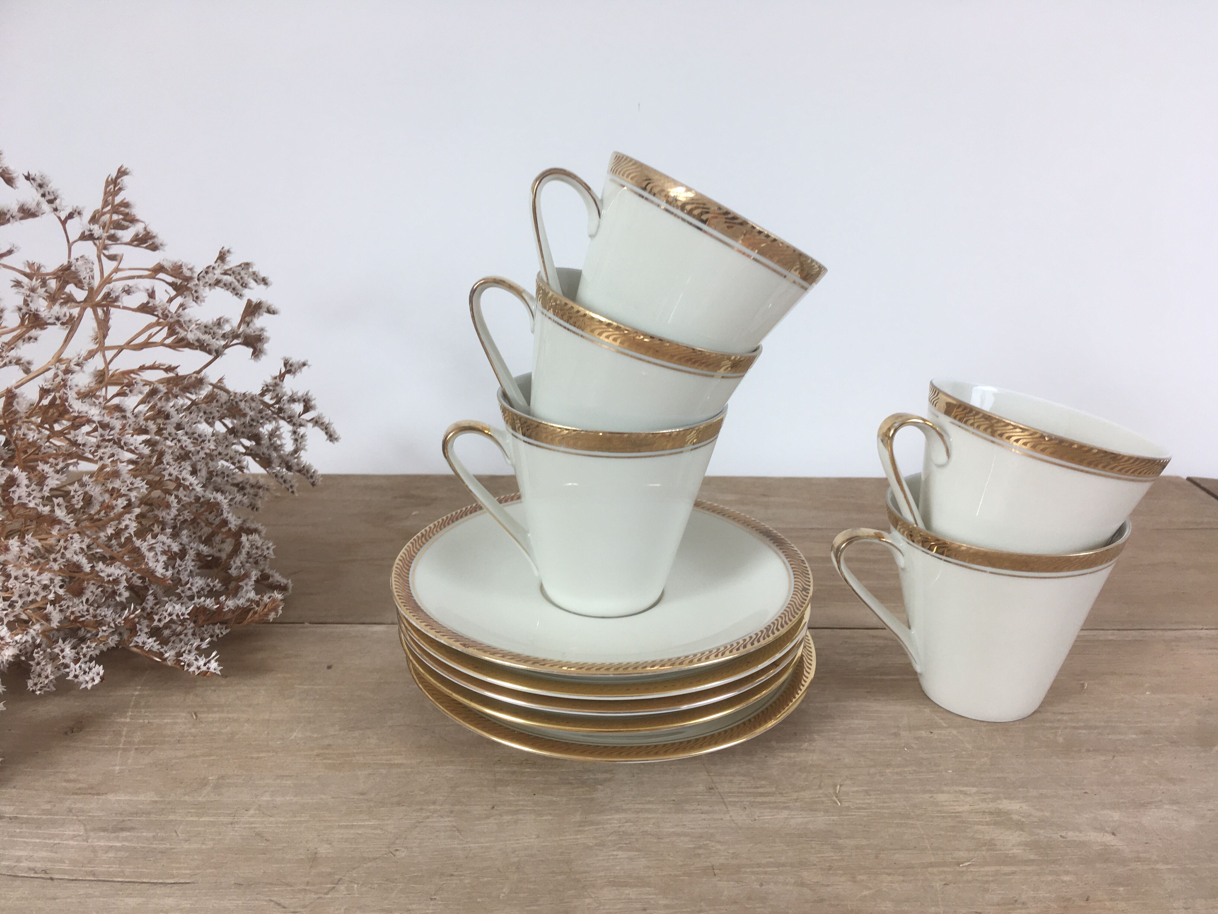 White & gold porcelain coffee cups