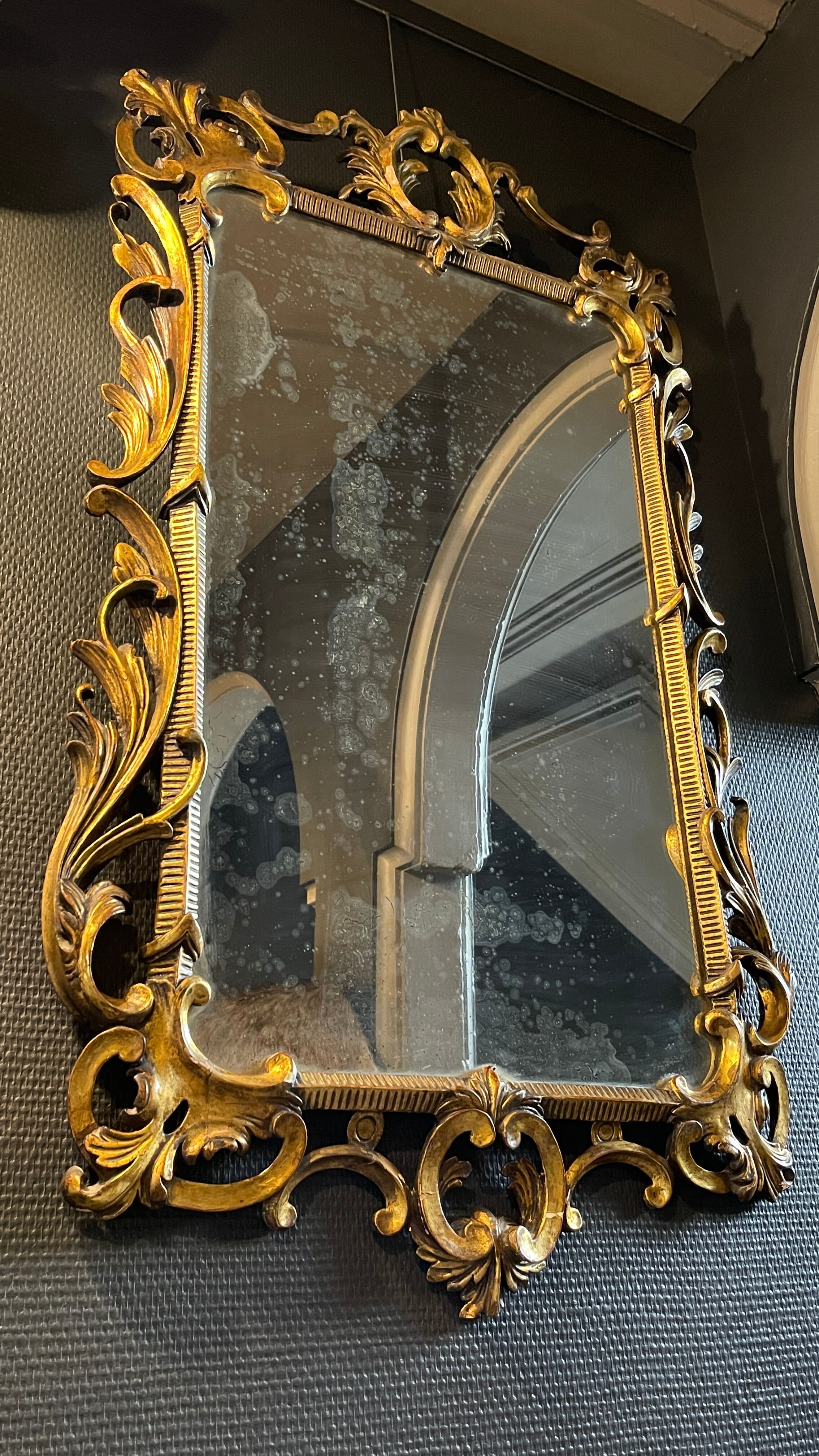 Gilded mirror Louis XV Rocaille in Carved and Stuqué Wood, nineteenth century