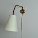 Scandinavian Modern brass wall lamp with adjustable arm
