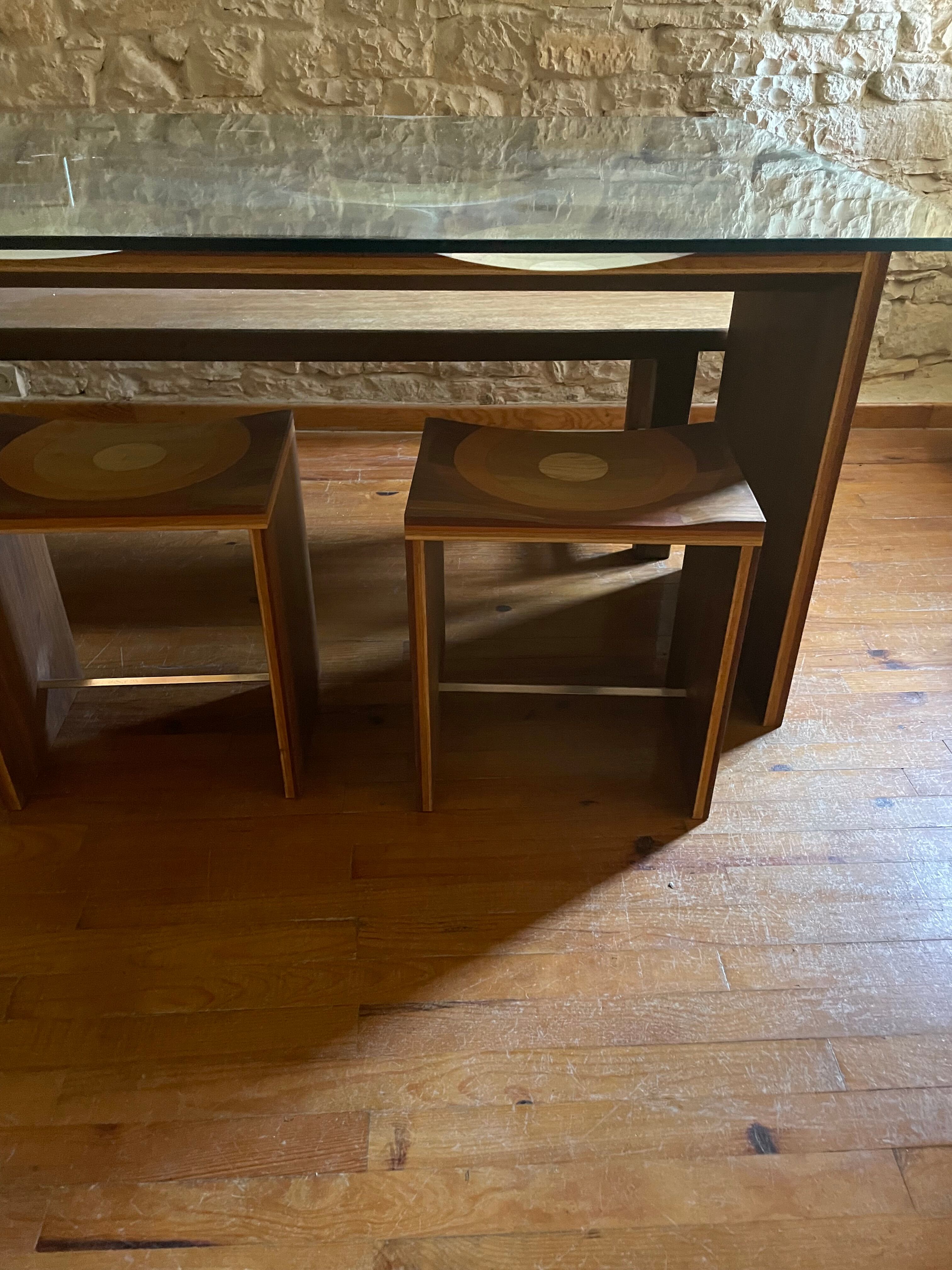 Dining table and 3 Ripples stools by Toyo Ito.