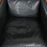 Set of 2 black leather Art Deco design armchairs in good condition