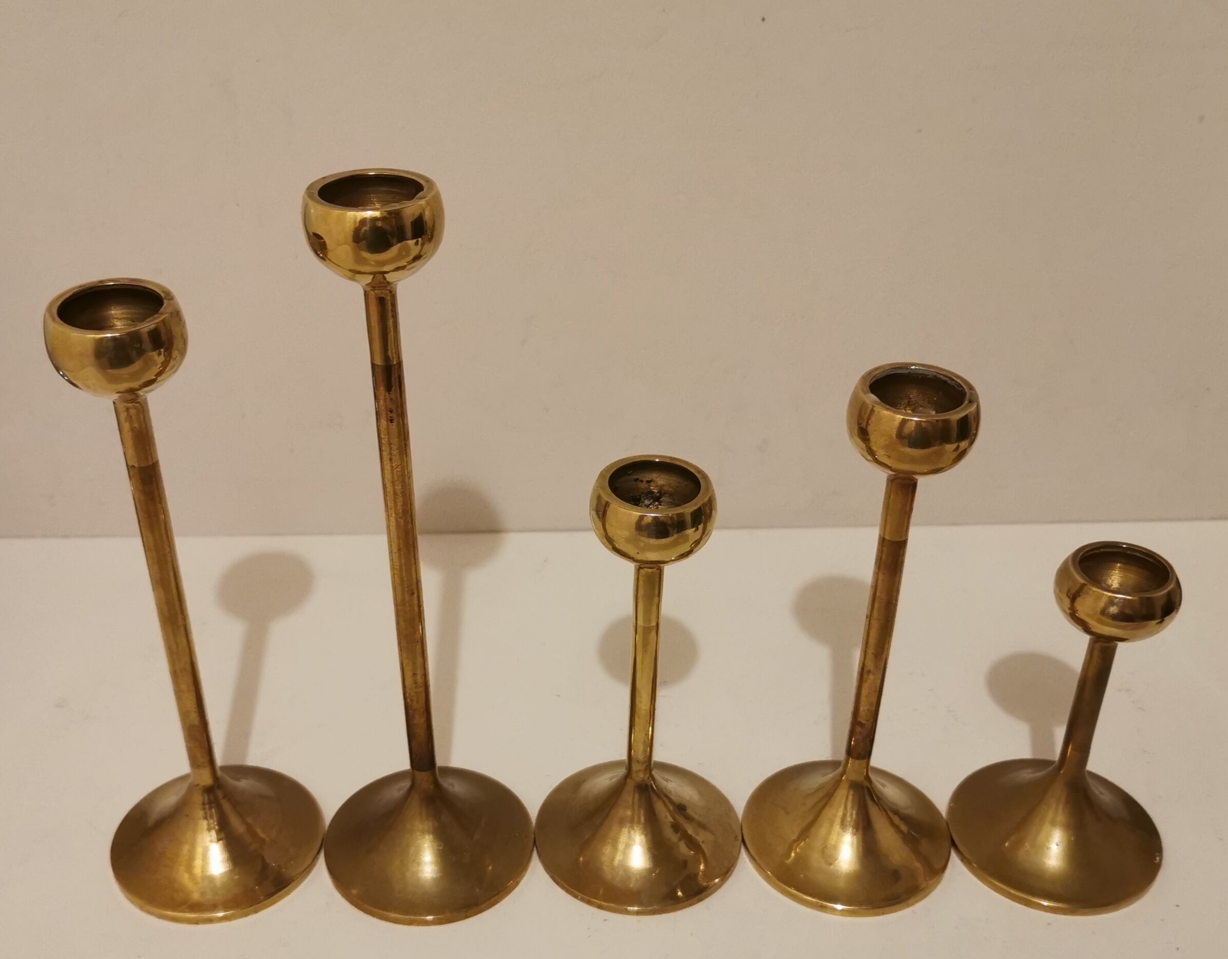 Set of 5 brass candlesticks from the 70s