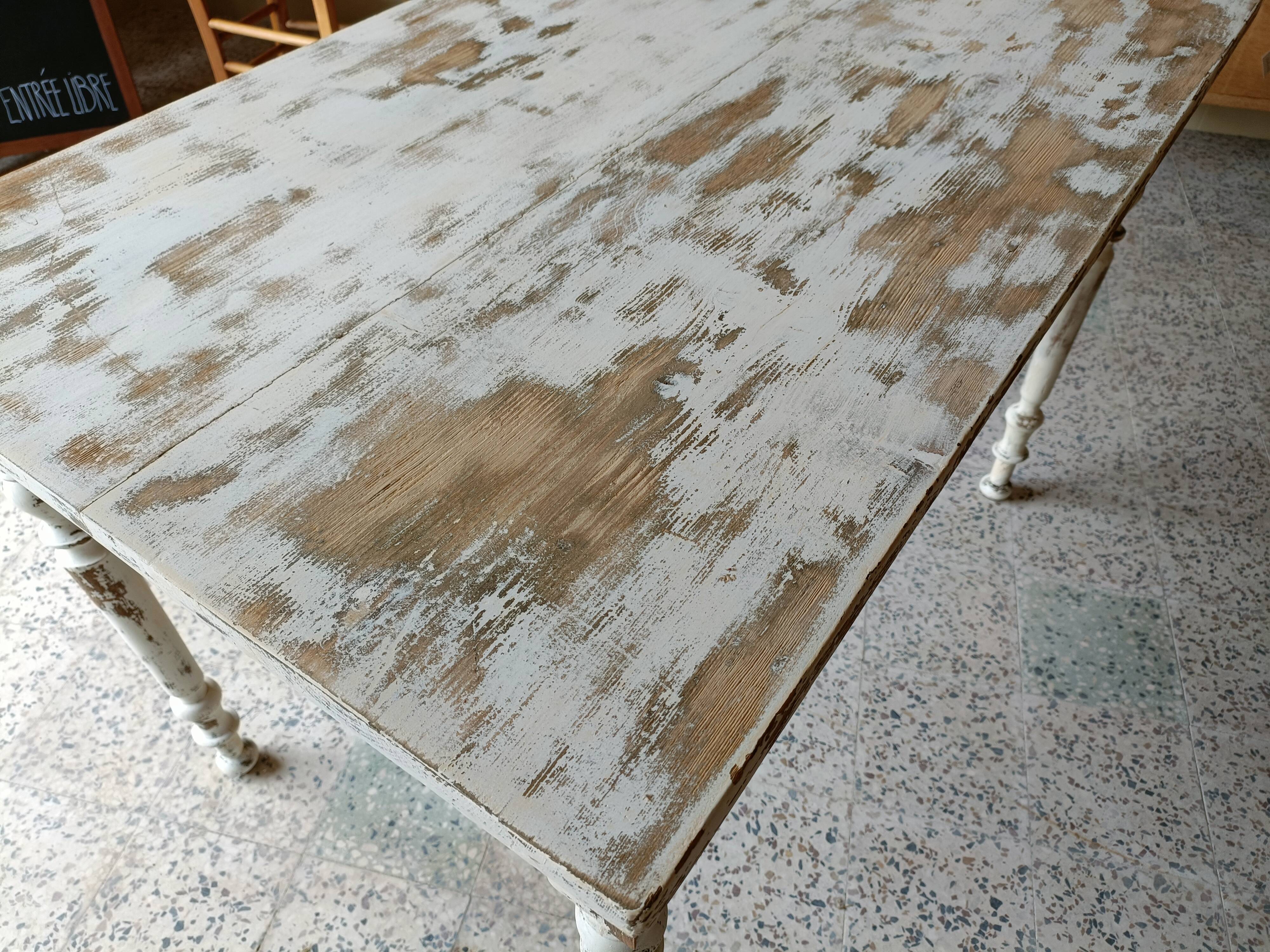 Patinated wooden table, restored.