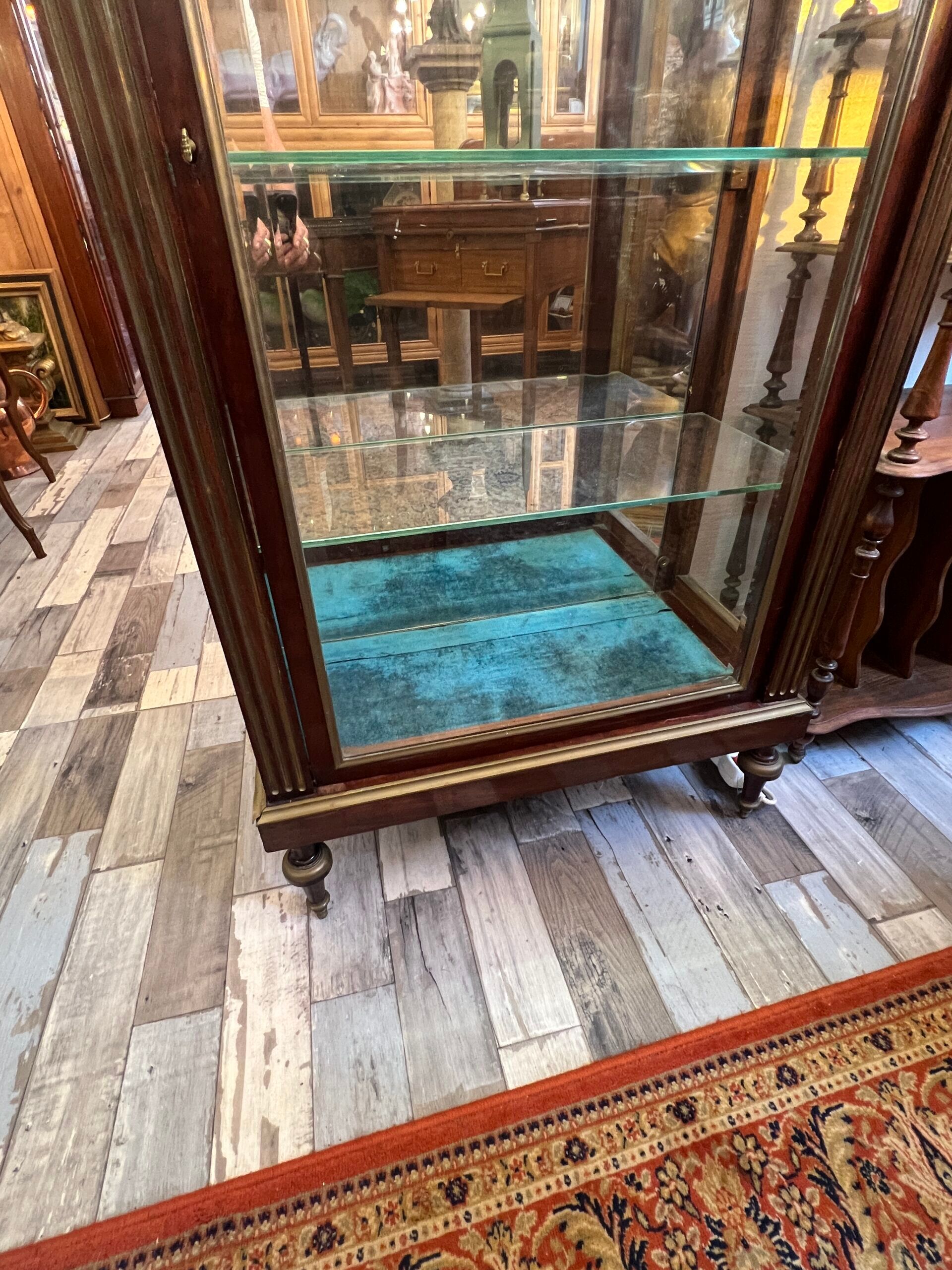 Louis XVI style display cabinet, in mahogany and mahogany veneer, with a red marble top with gallery