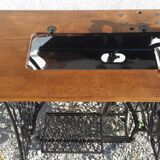 Singer's sewing machine foot console