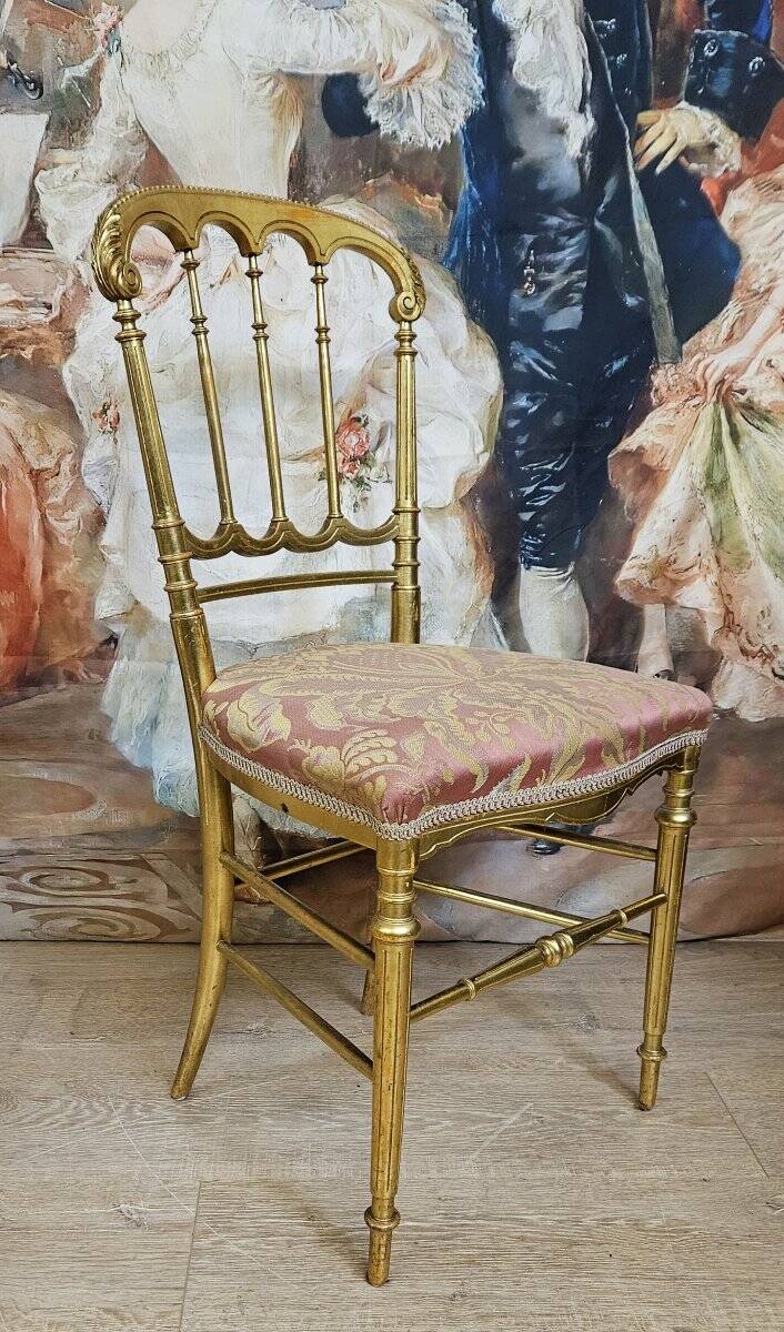Napoleon III theatre chair in gilded wood