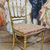 Napoleon III theatre chair in gilded wood