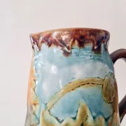 Old glazed stoneware pitcher - autumn