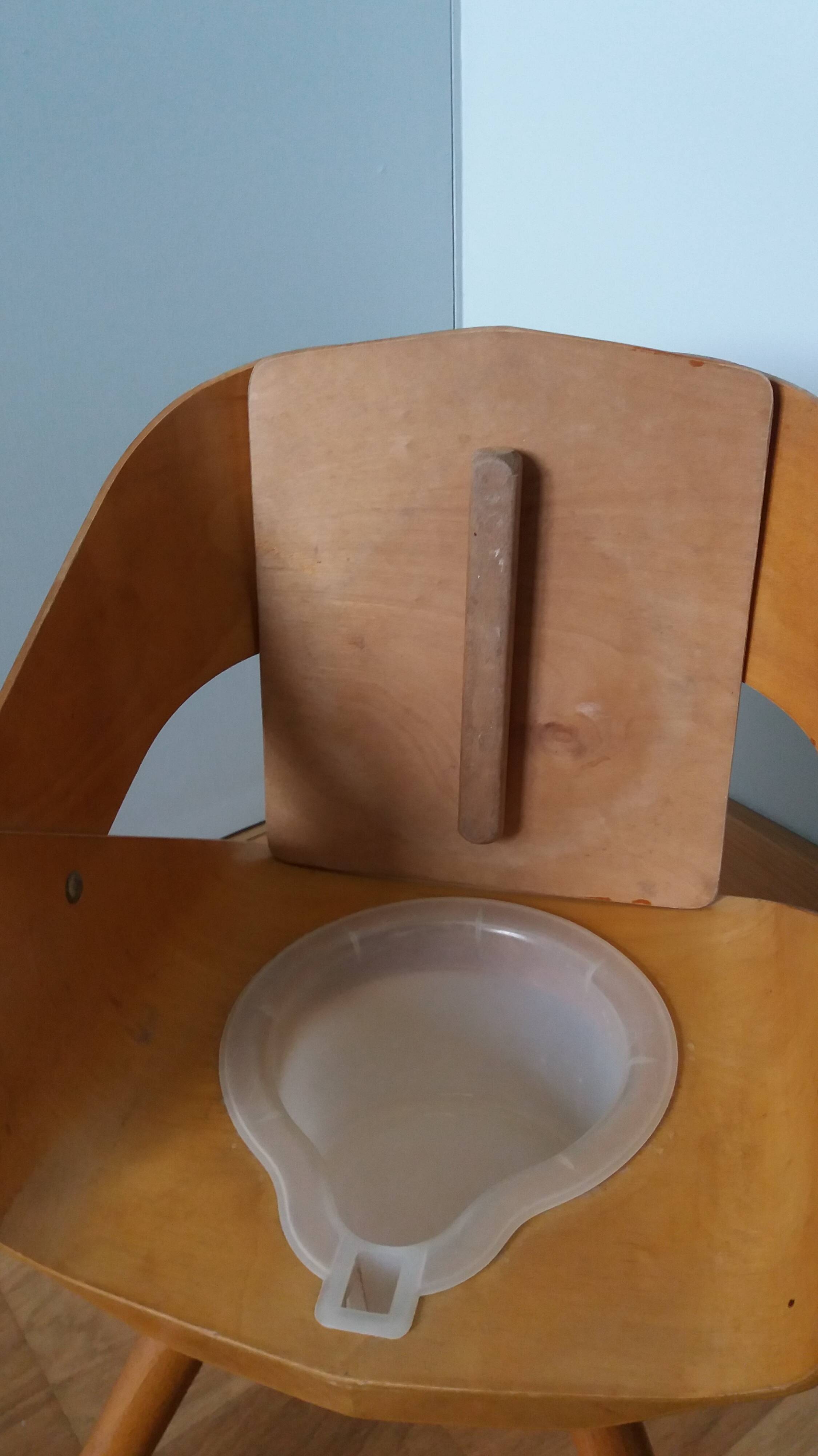 Baumann Baby Coquille children's armchair in bent wood with splayed legs.