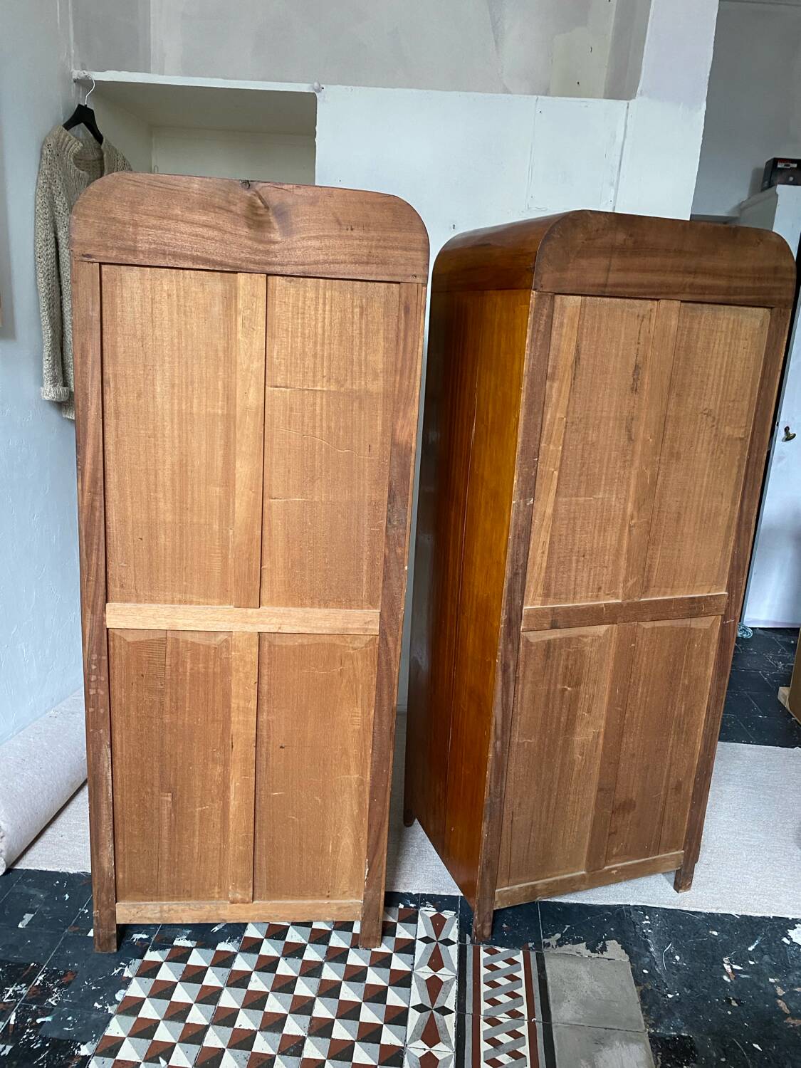 Pair of rounded mirrored wardrobes