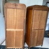Pair of rounded mirrored wardrobes