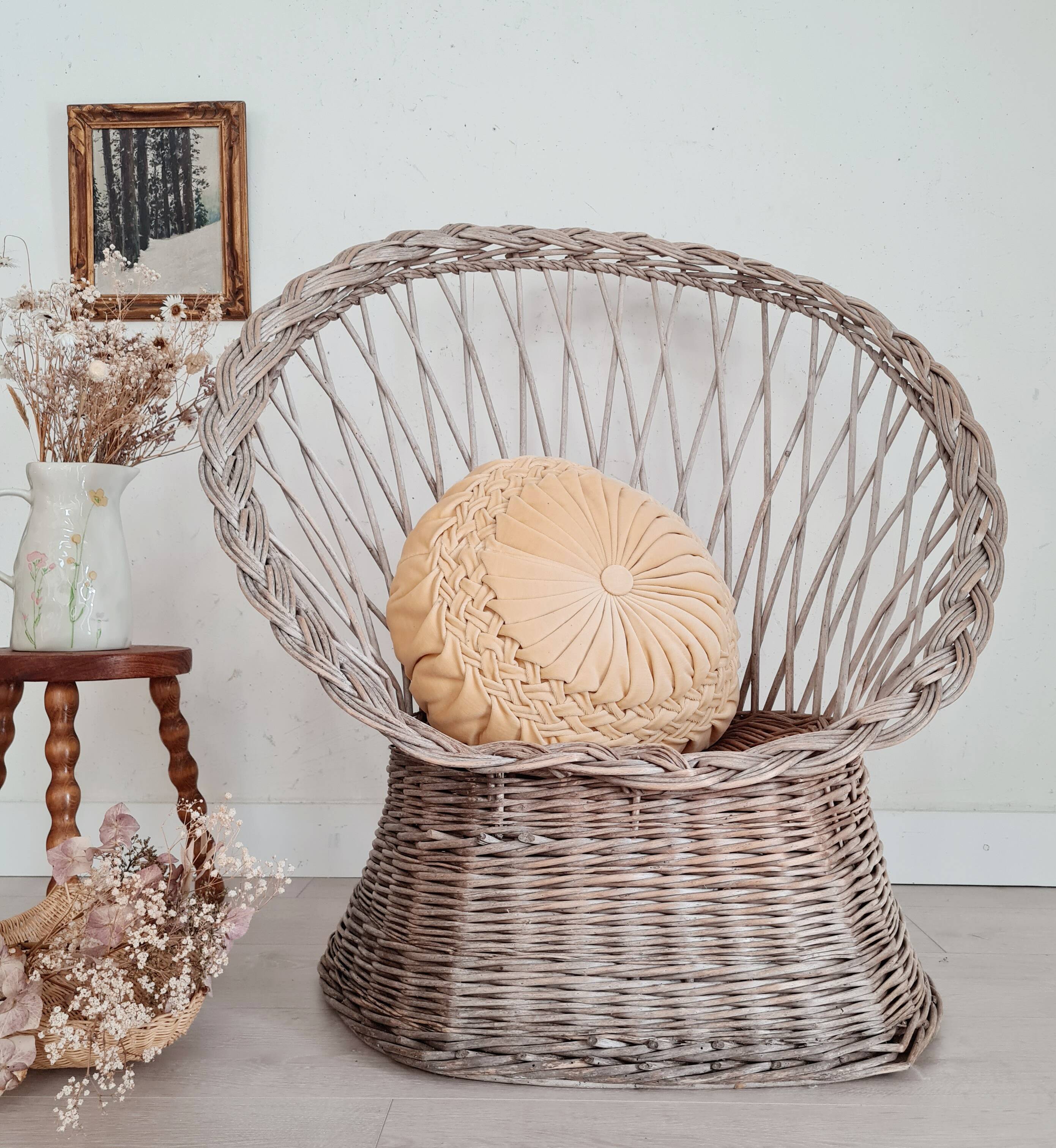 Antique armchair in gray woven wicker