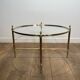 Neoclassical Round Coffee Table in Brass with Fluted Supports and Floral Motifs