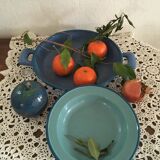Two matching enameled dishes in green and blue