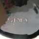 Centre-table dish shaped like horseshoe in ceramic