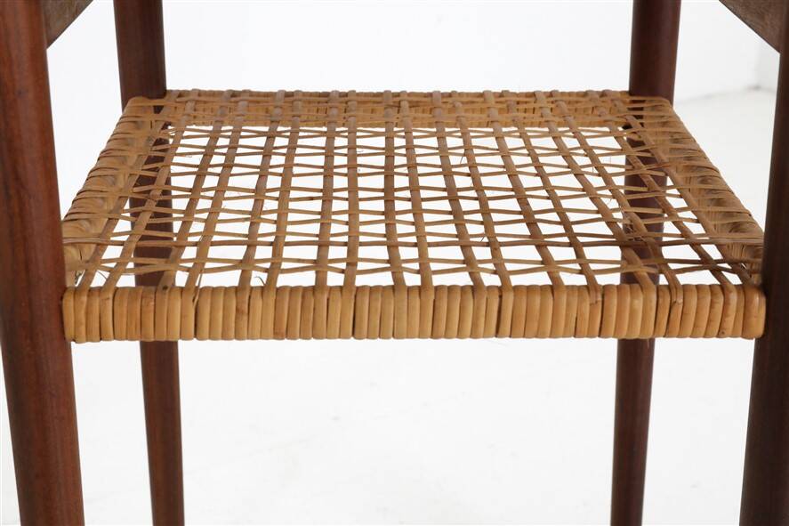 Rare set of three teak nesting tables with cane magazine rack / side tables / mid-century Danish modern design / 1950s / 1960s