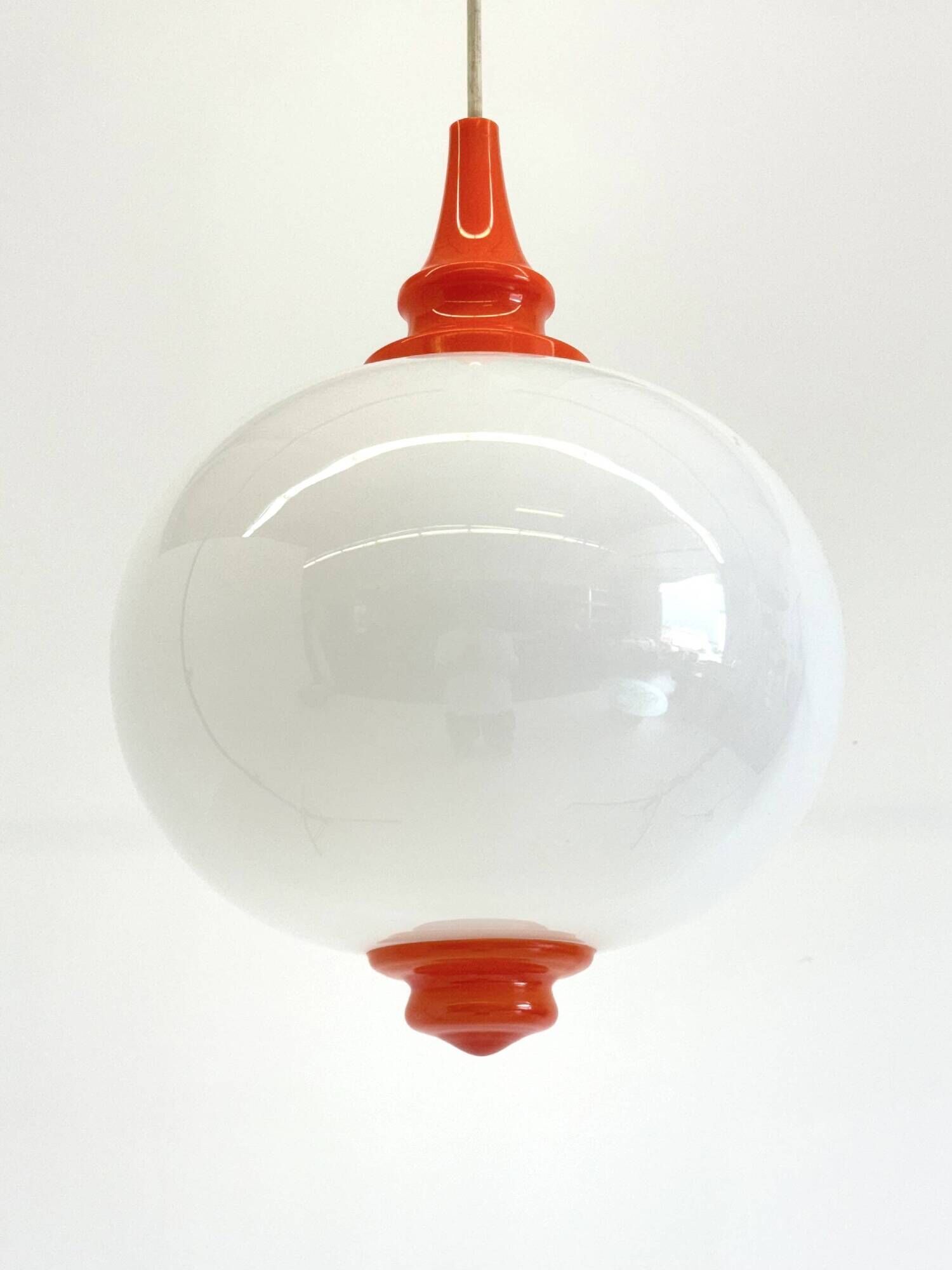 Space Age pendant lamp with milk glass ball and orange accents