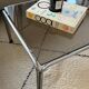 Ancienne table basse chrome et verre fumé vintage