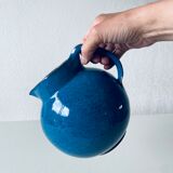 Old pitcher in glazed stoneware