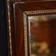 Mirror style restoration enhances brass mahogany