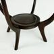 Italian round coffee table from the 1950s with a glass top, attributed to Carlo di Carli.