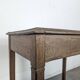 Small oak side table with one drawer, 19th-century tapered legs.