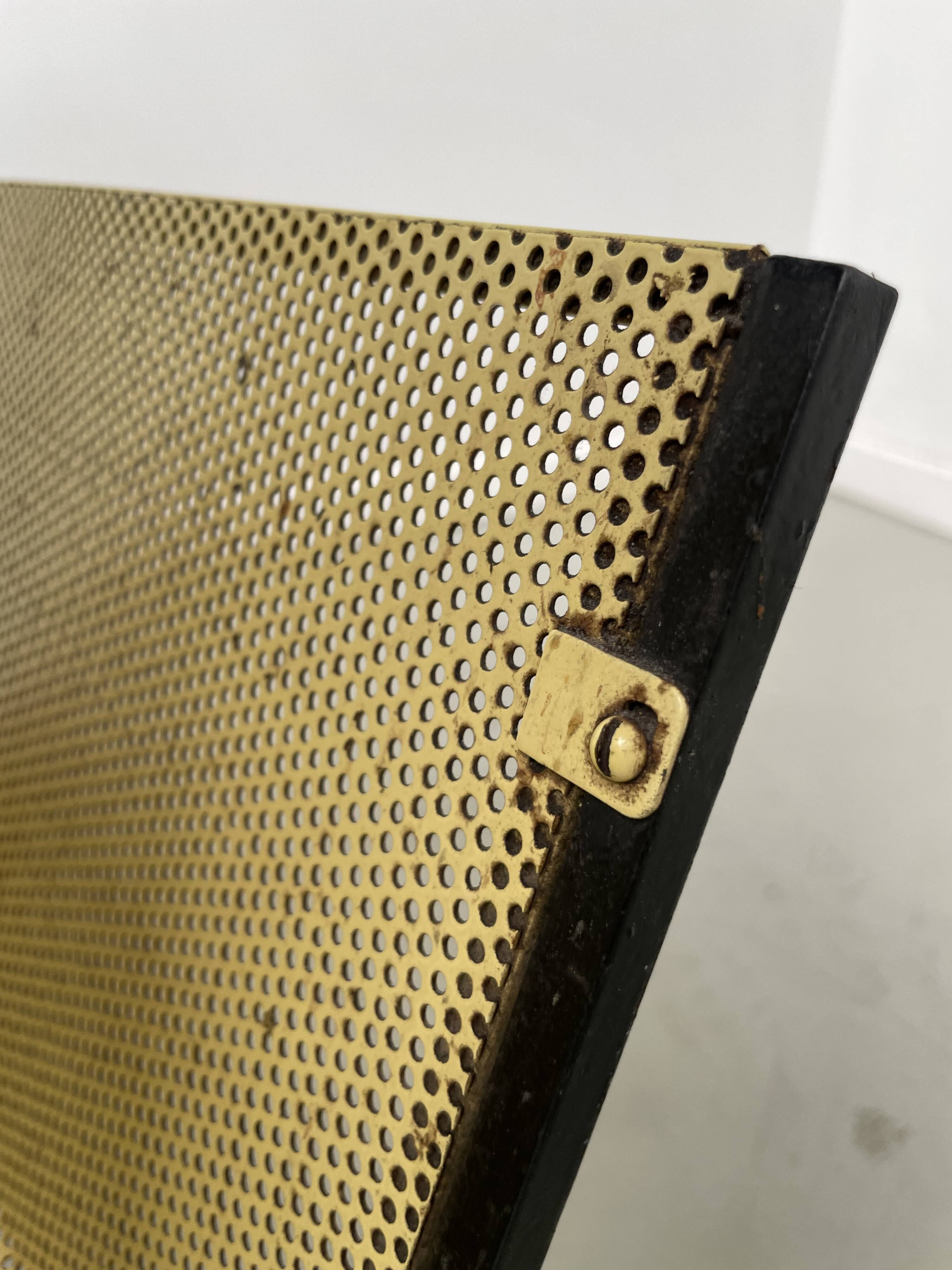 Perforated metal serving trolley in the Mathieu Matégot style