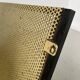 Perforated metal serving trolley in the Mathieu Matégot style