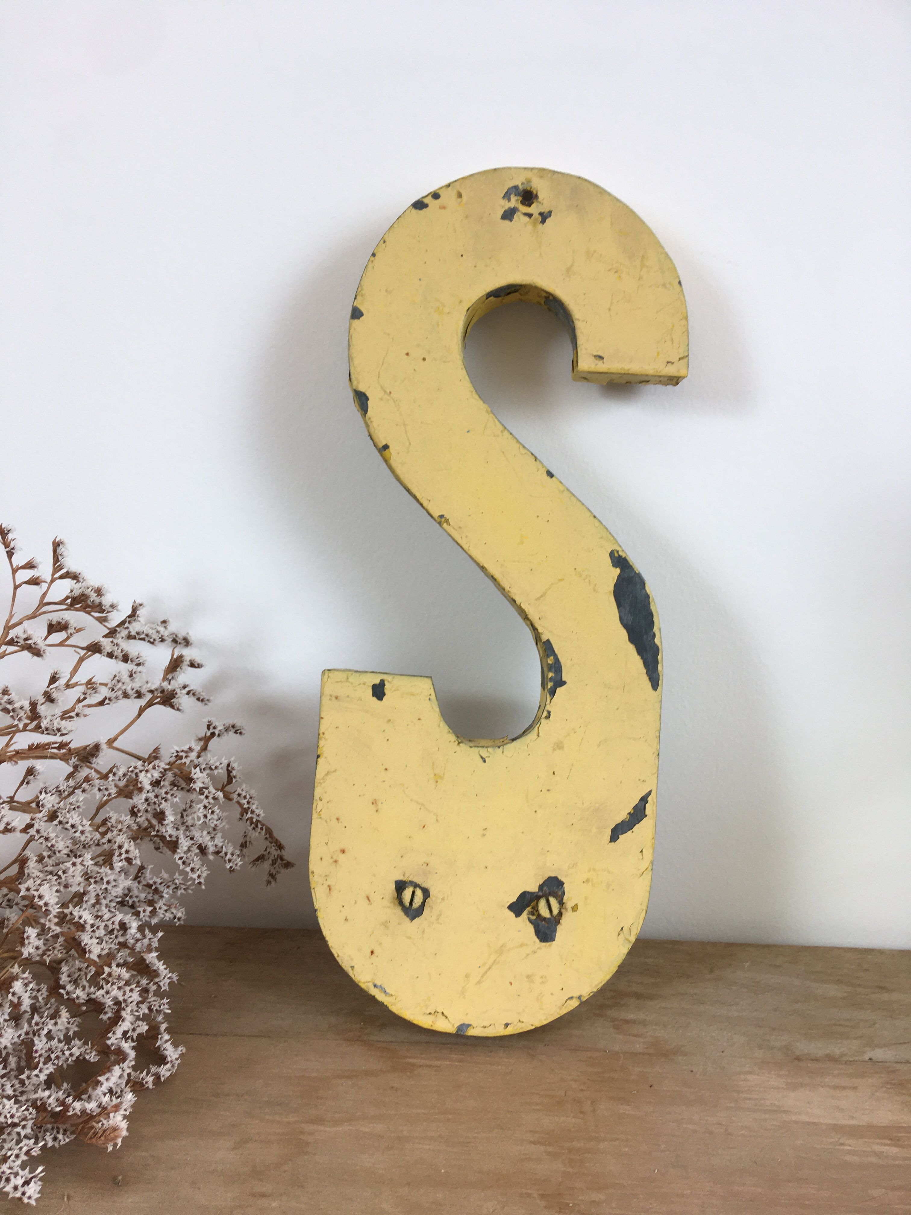 Vintage yellow sign letter S